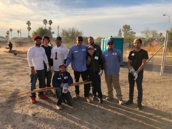 Group of volunteers posing together during the 2017 Arizona Builders Alliance Volunteer Day.